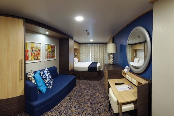 Inside of the Balcony Cabin onboard Anthem of the Seas with Curtain closed