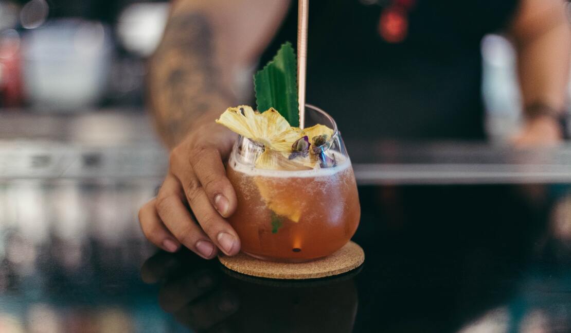 Bartender serving an alcoholic cocktails onboard MSC Meraviglia