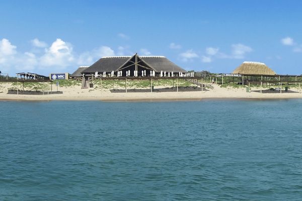 Portuguese Islands - Shaded structures on the beach overlooking the Indian Ocean | 600 x 400