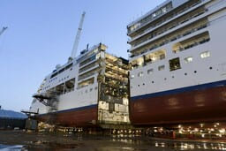 Silver Spirit being lengthened in dry dock - cut in two and waiting for the extra piece