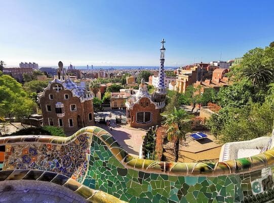 Park Güell in Barcelona, Spain. Famous park designed by Gaudí. Silversea luxury cruise ship docked in the harbor from Barcelona to Lisbon to Palma de Mallorca