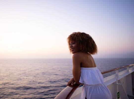 Lady looking at the ocean on board MSC Splendida