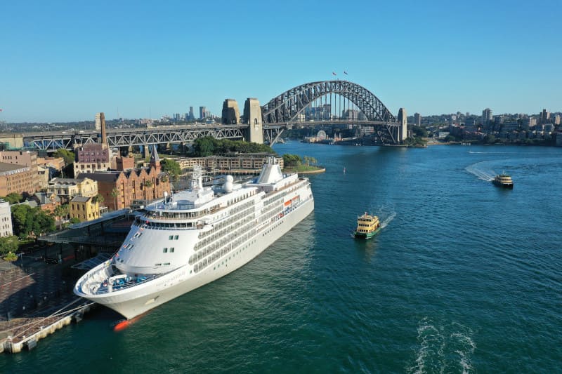 Silversea Cruises' elegant Silver Shadow welcomes guests boarding for the 2023 World Cruise / grand voyages, set against the backdrop of Sydney.