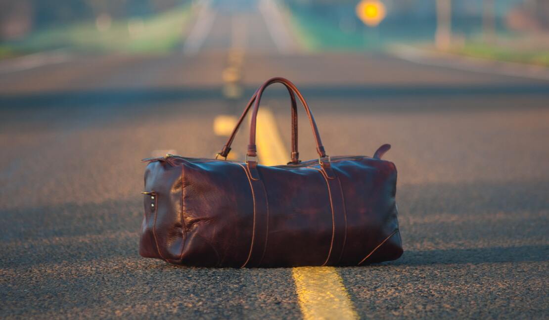 Beautiful Brown Leather Bag to illustrate the 20 Useful Items You Absolutely Need to Pack for Your Cruise | by Jed Owen 1110x647