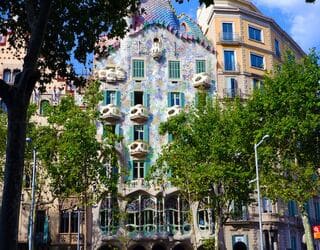 Casa Batlló flamboyant building that is covered in thousands of multi-coloured tiles