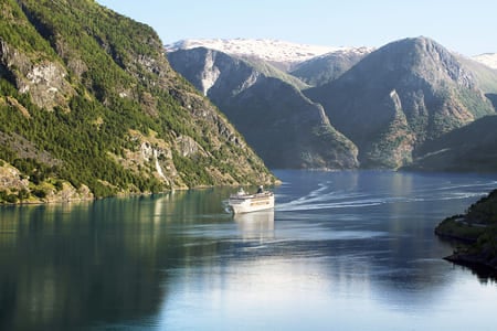 MSC Opera cruising down the Norwegian Fjord